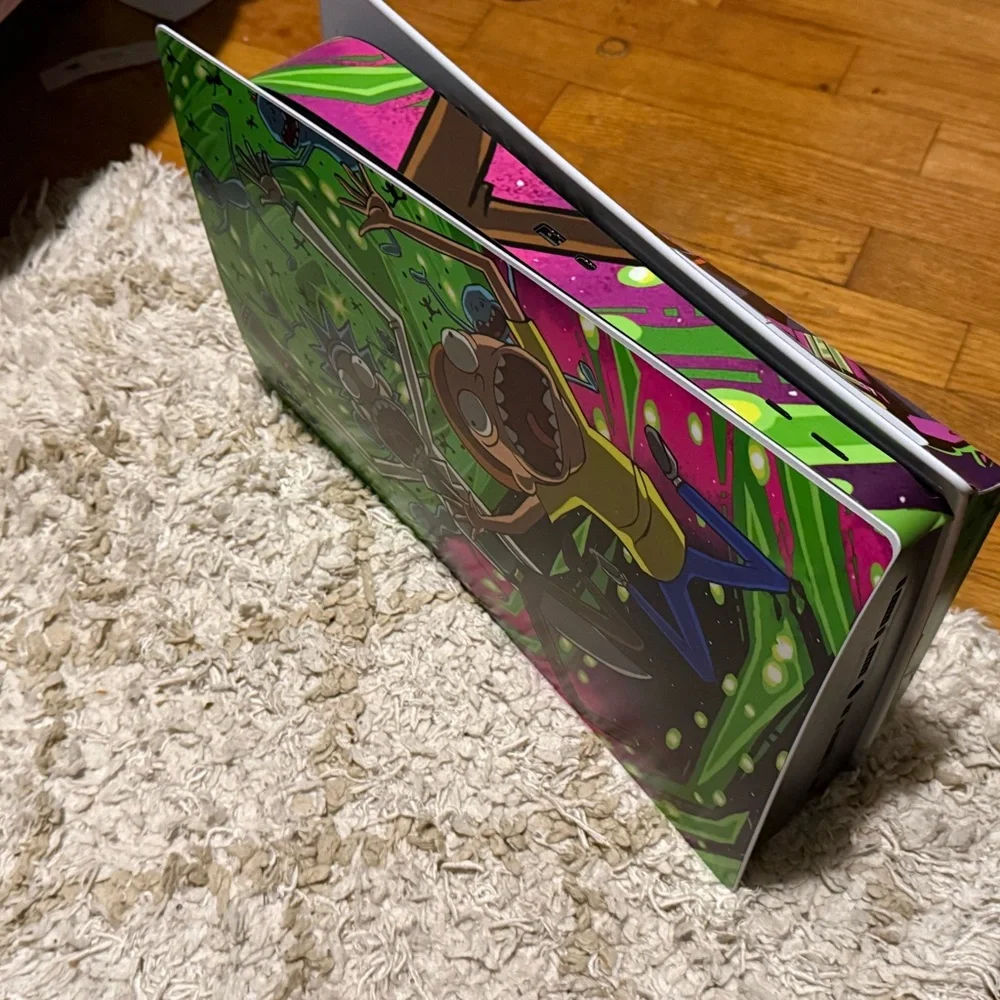 Sony Custom Console with Black and Multicolor Controllers